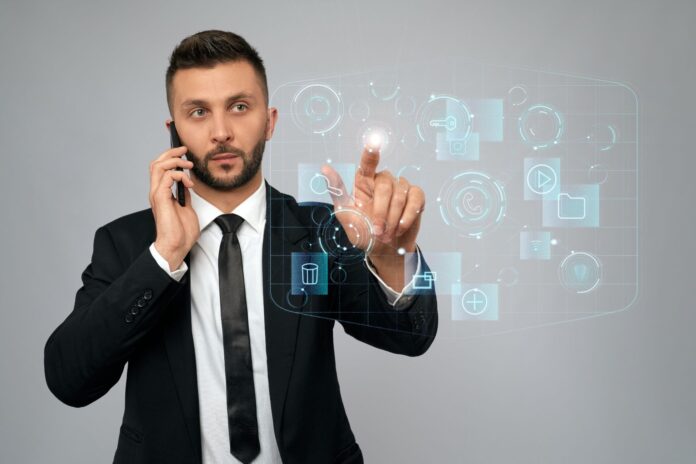 A professional man in a black suit and tie using an intelligent calling system, holding a smartphone to his ear with one hand while interacting with a futuristic virtual interface with his other hand, displaying icons for calls, files, and digital controls.