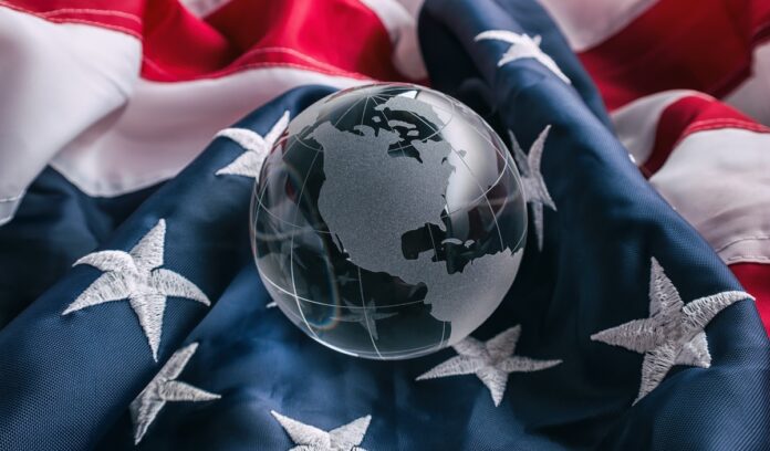 earth glass globe on a ameria flag. ideal for websites and magazines layouts