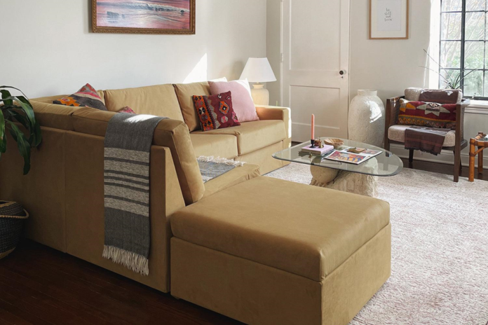 Cozy living room with tan sofa.
