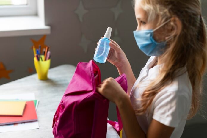 girl-putting-her-disinfectant-her-backpack_23-2148672145 How Custom Printed Mylar Pouches Support Multiple Industries With One Format